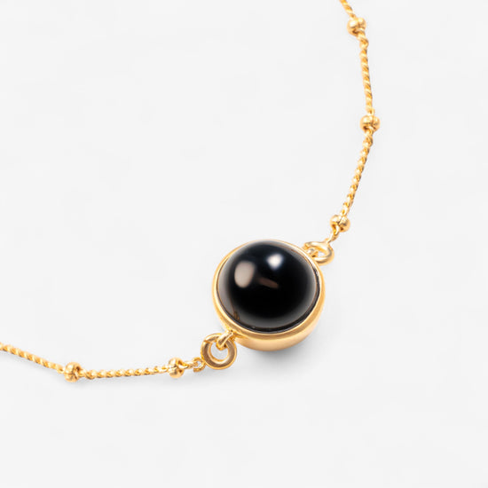 
                  
                    Bracciale Onyx - Malira - Orecchini
                  
                