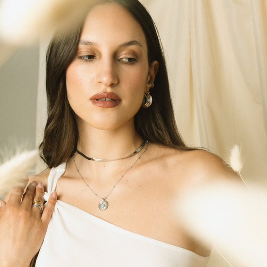 
                  
                    Choker Rhea - Malira - Orecchini
                  
                